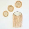 Miroir œil à franges en rotin
