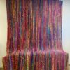 Tapis multicolore fait main avec des tissus recyclés